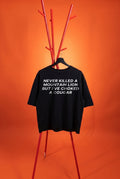 black t-shirt with dad joke on an orange background