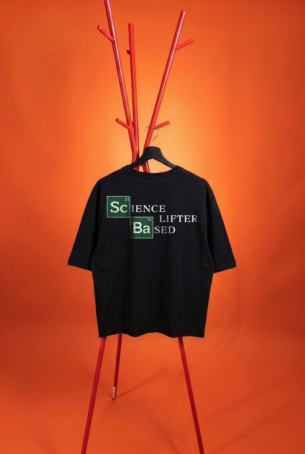 black t-shirt with "science based lifter" text on an orange background